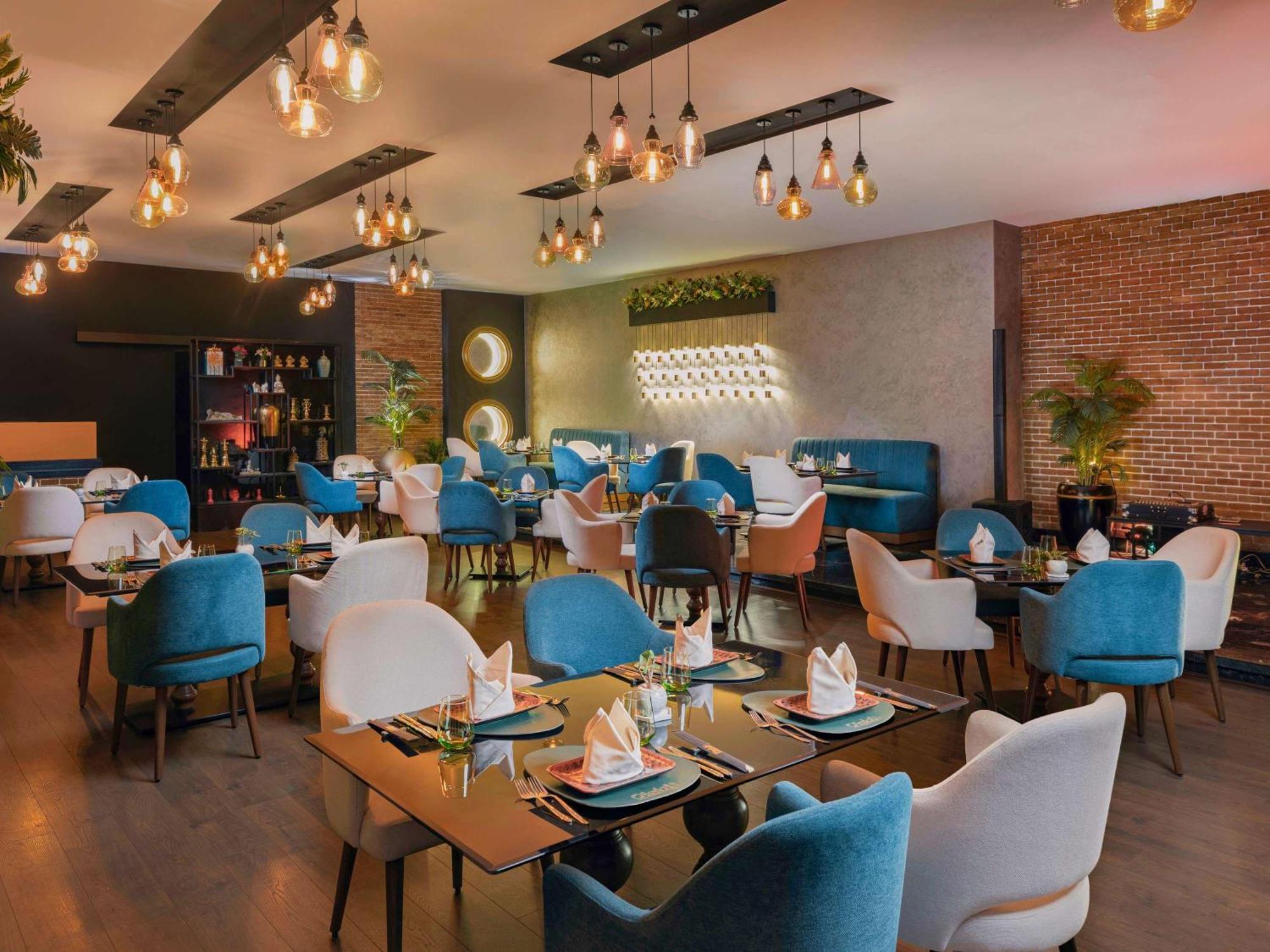 Moevenpick Hotel Cairo - Media City ギーザ エクステリア 写真 The restaurant